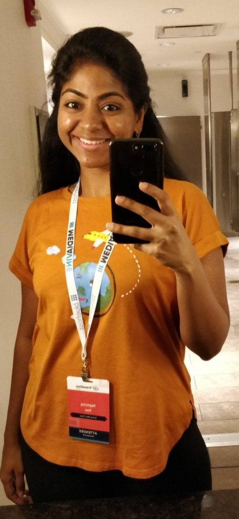 Mirror selfie with my TravelCon badge
