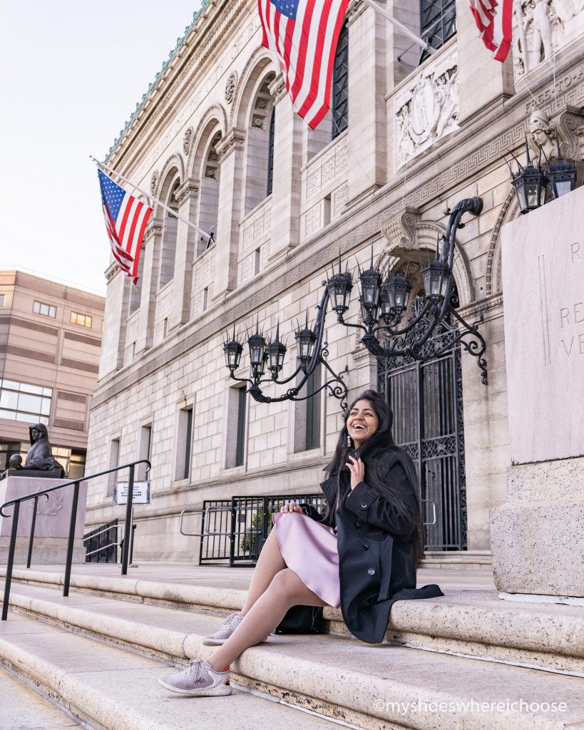 Girl outside Boston Public Library