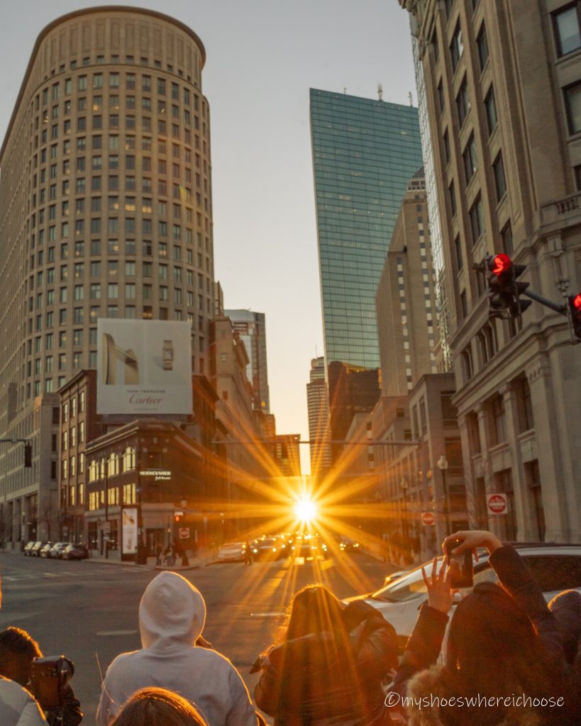 Group viewing and photographing the Bostonhenge